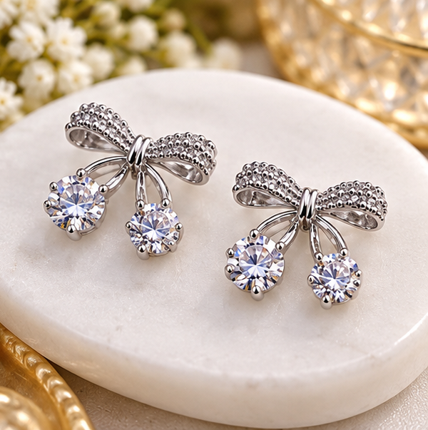 Elegant Silver Bow Crystal Drop Earrings