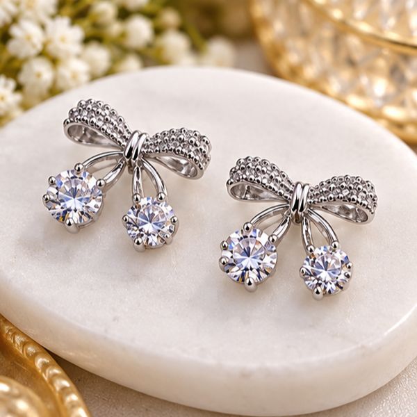 Elegant Silver Bow Crystal Drop Earrings